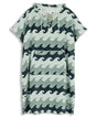 Blue towel poncho with wave pattern on a white background