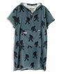 Blue towel poncho with black Sasquatch pattern on a white background