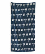 Navy blue towel with white palm tree pattern on a white background
