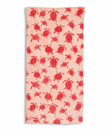 Beach towel with pink turtle pattern on a white background
