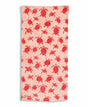 Beach towel with pink turtle pattern on a white background